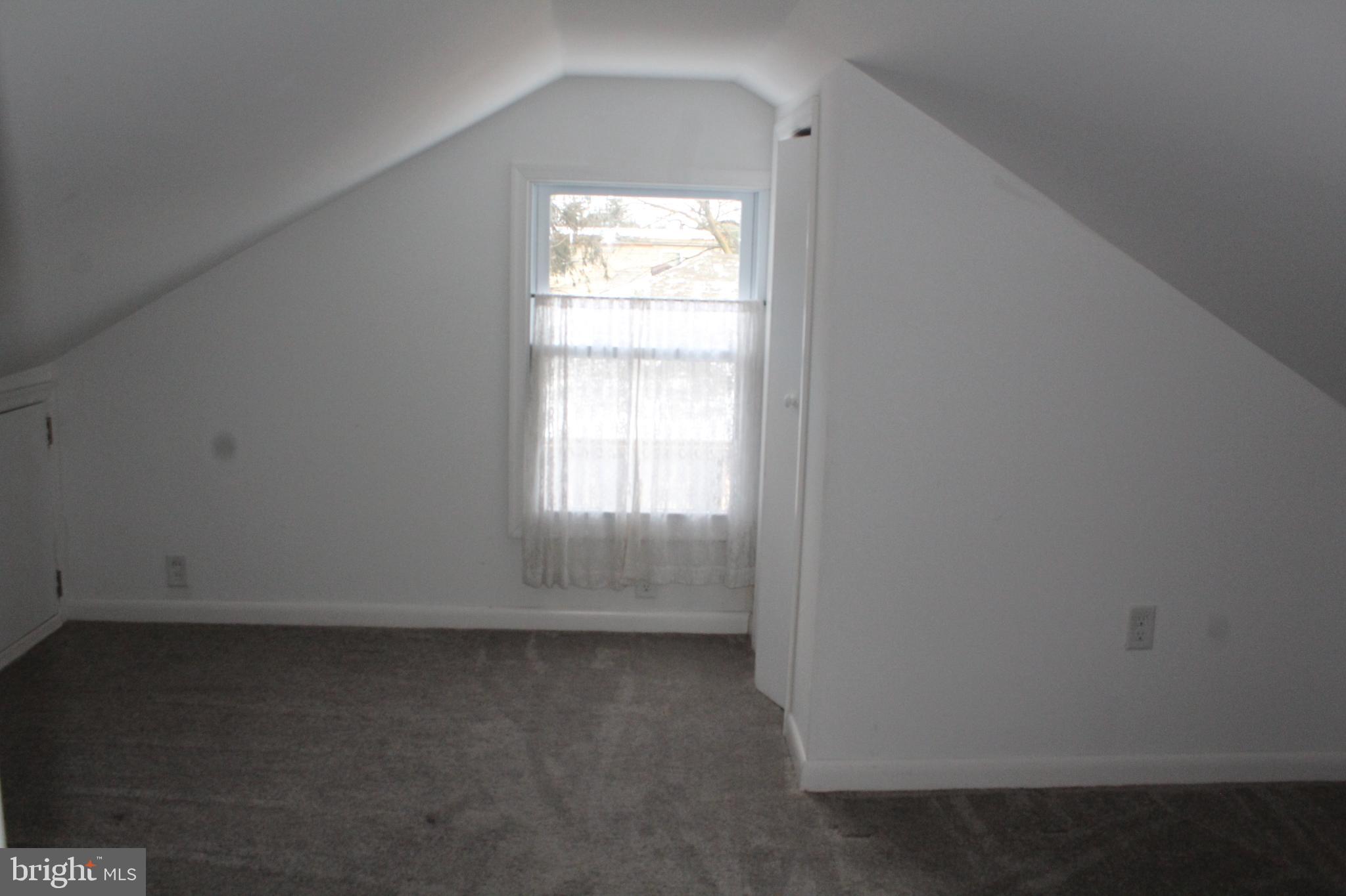 4529 Devonshire Road Harrisburg, PA 17109 - Photo 11 of 22 an empty room with a window