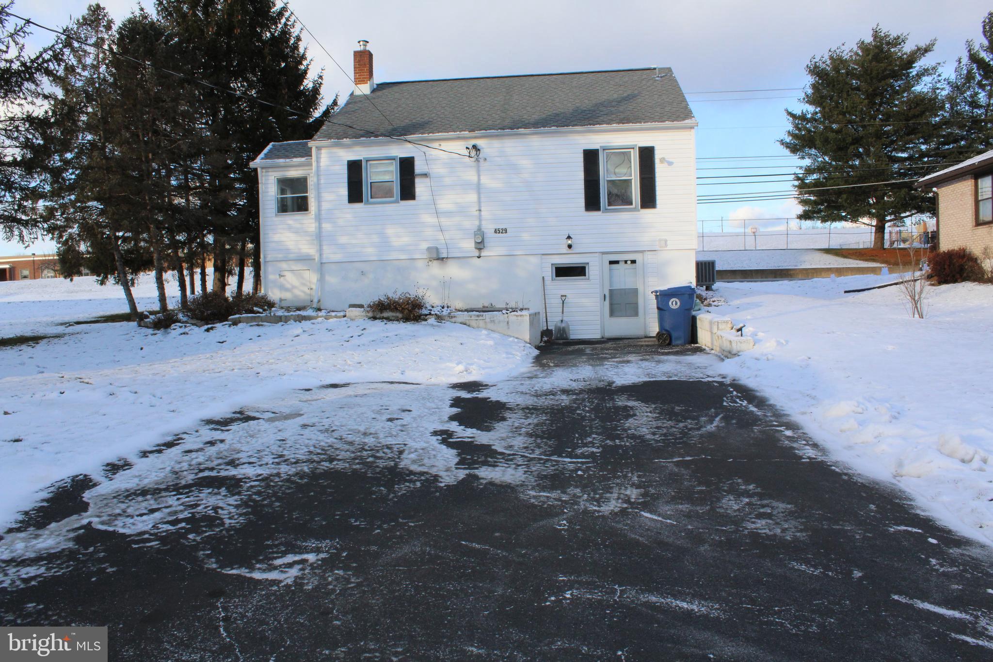 4529 Devonshire Road Harrisburg, PA 17109 - Photo 21 of 22 a view of a house with a yard