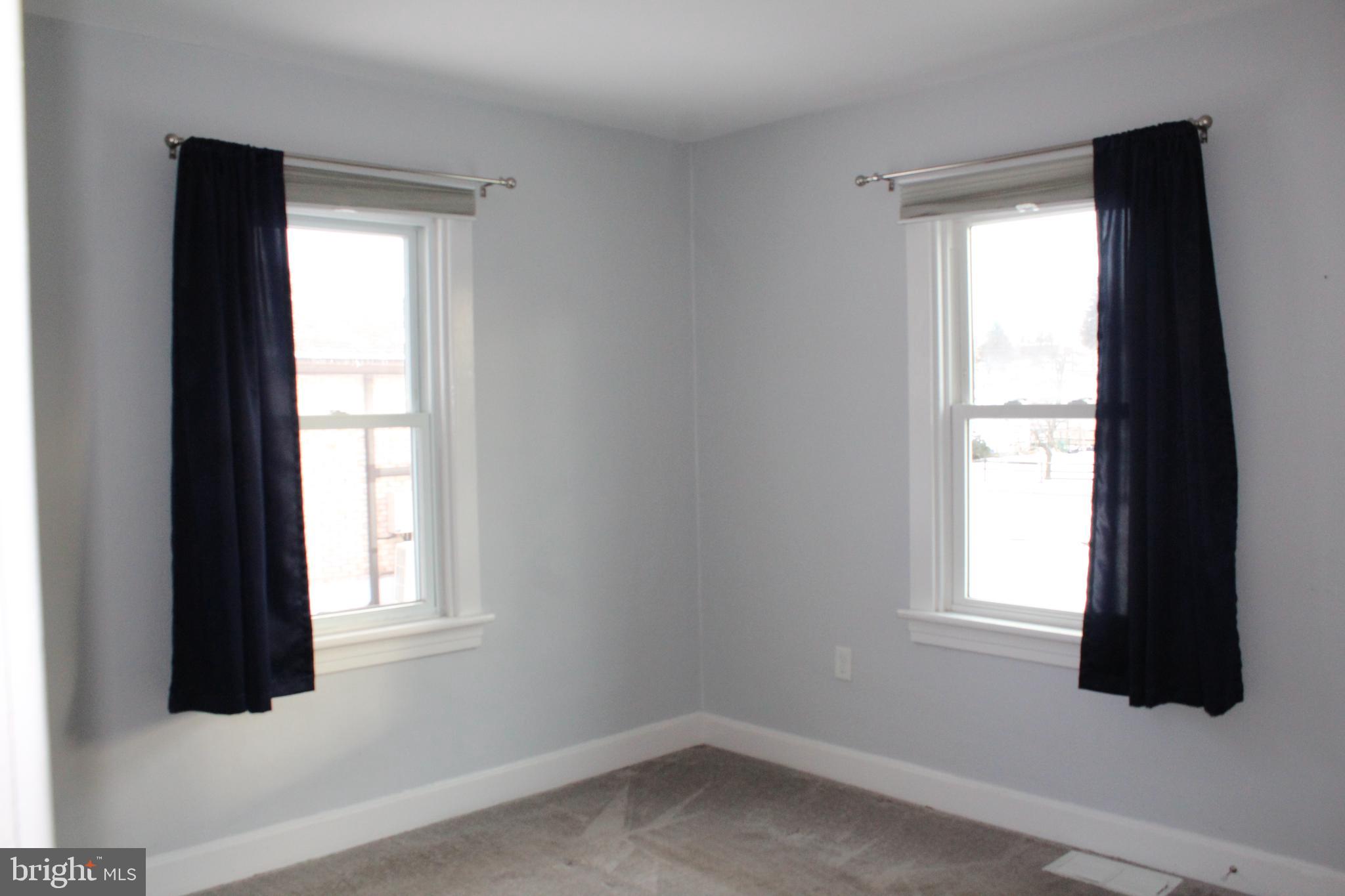 4529 Devonshire Road Harrisburg, PA 17109 - Photo 8 of 22 a room that has a window in it