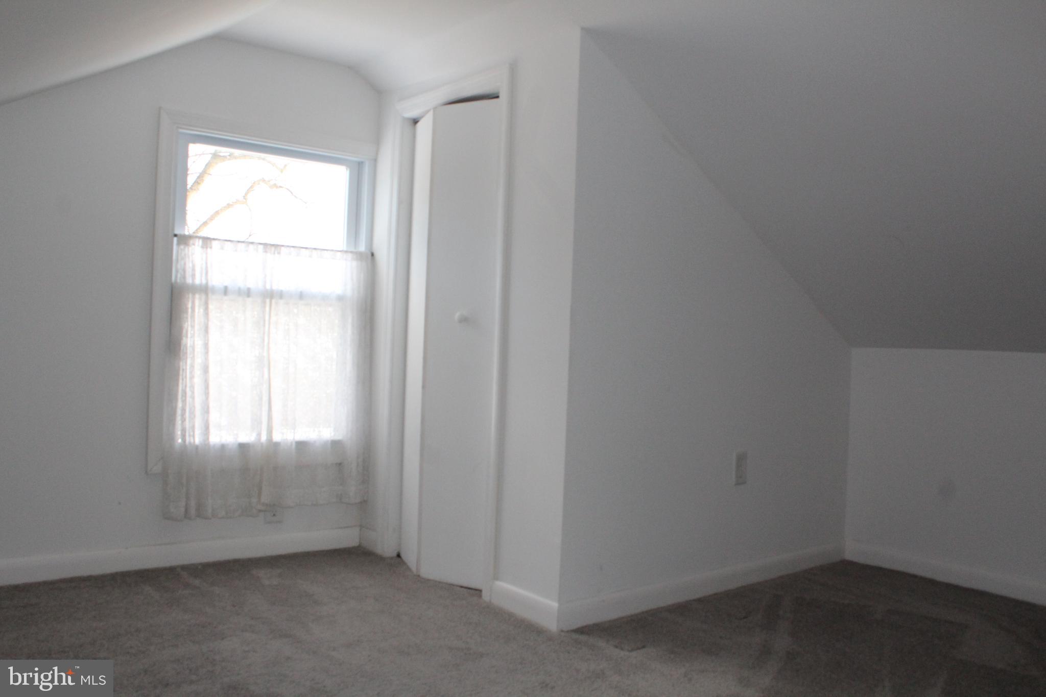 4529 Devonshire Road Harrisburg, PA 17109 - Photo 10 of 22 an empty room with a window