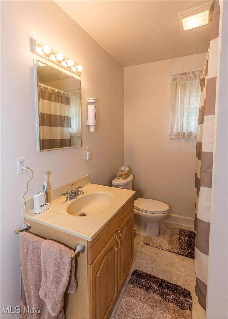 749 Amherst Road Northeast Massillon, OH 44646 - Photo 28 of 41 Bathroom with vanity and toilet