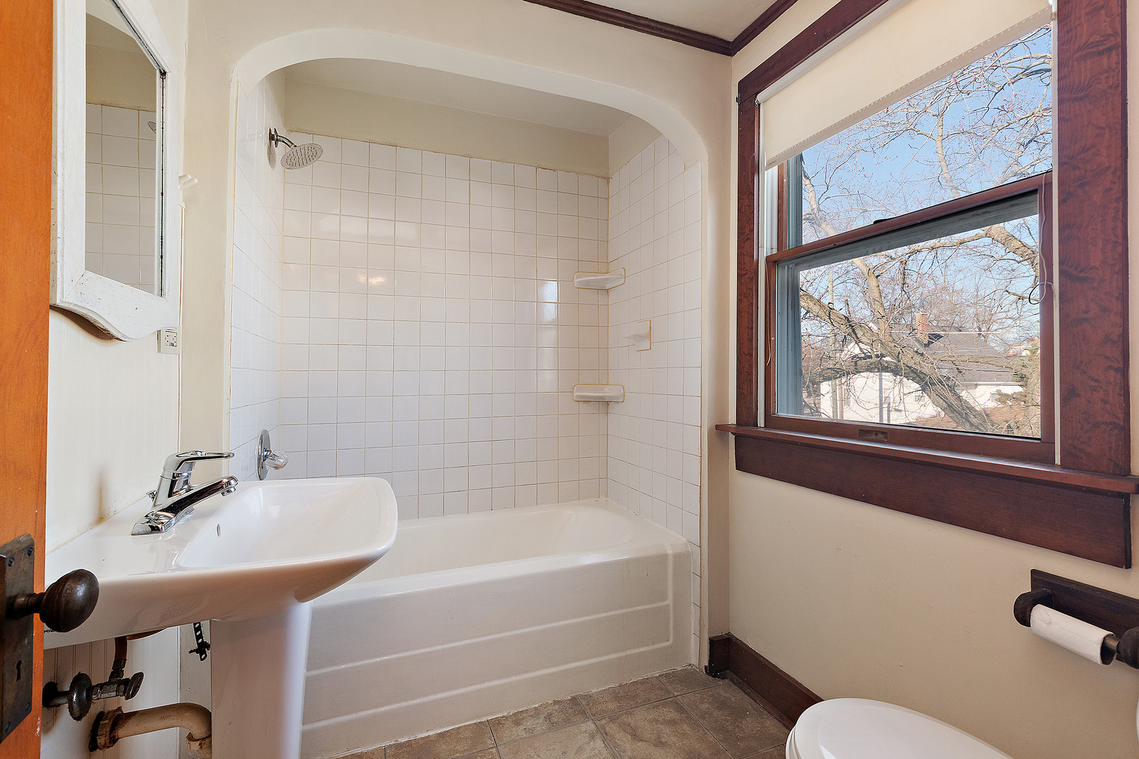 3316 Ann Street Lansing, IL 60438 - Photo 12 of 21 a bathroom with a tub sink and mirror