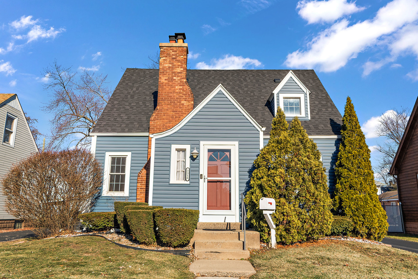 3316 Ann Street Lansing, IL 60438 - Photo 2 of 21 a front view of a house with a yard