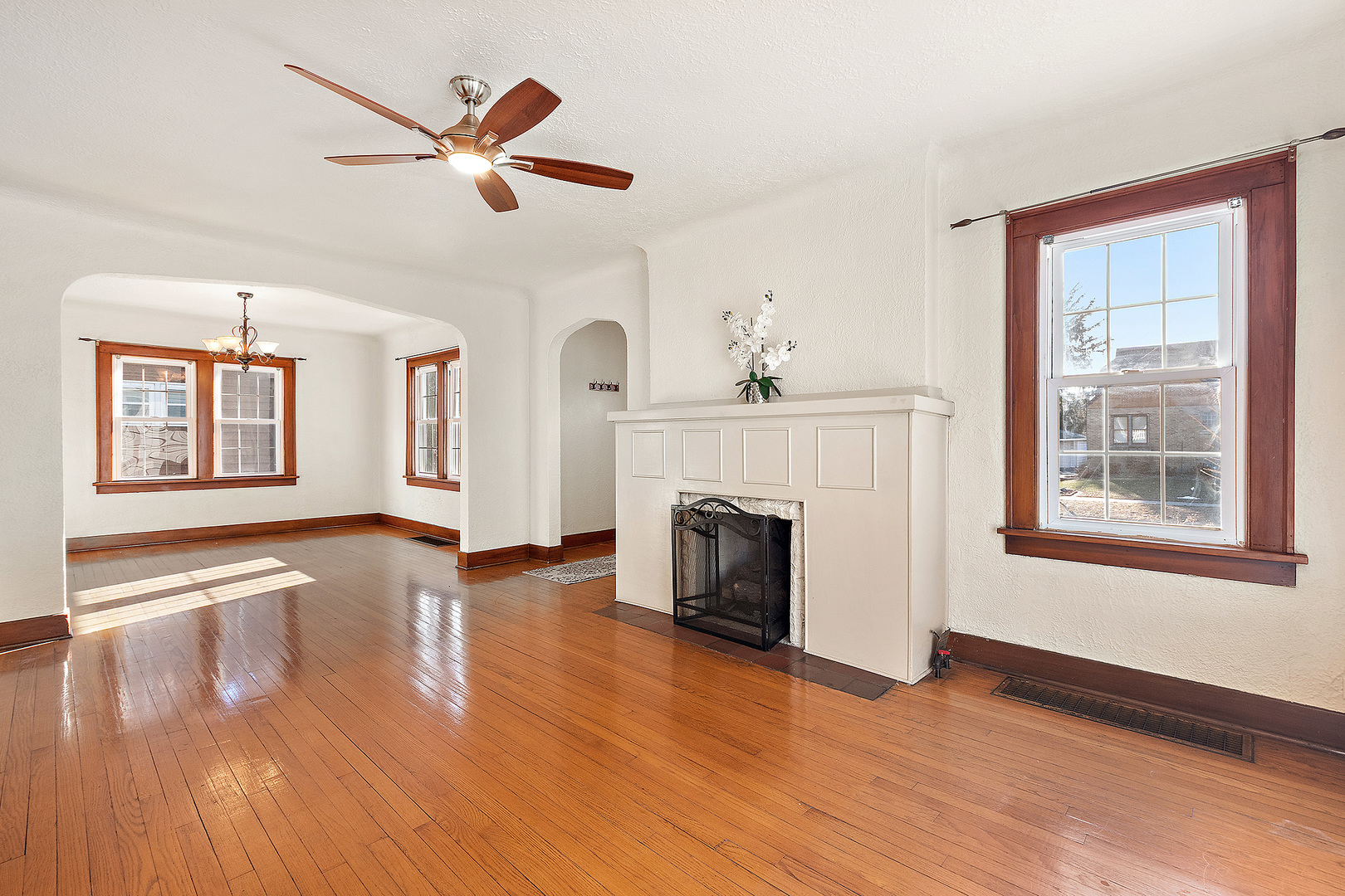 3316 Ann Street Lansing, IL 60438 - Photo 3 of 21 a view of livingroom and hardwood floor with fireplace