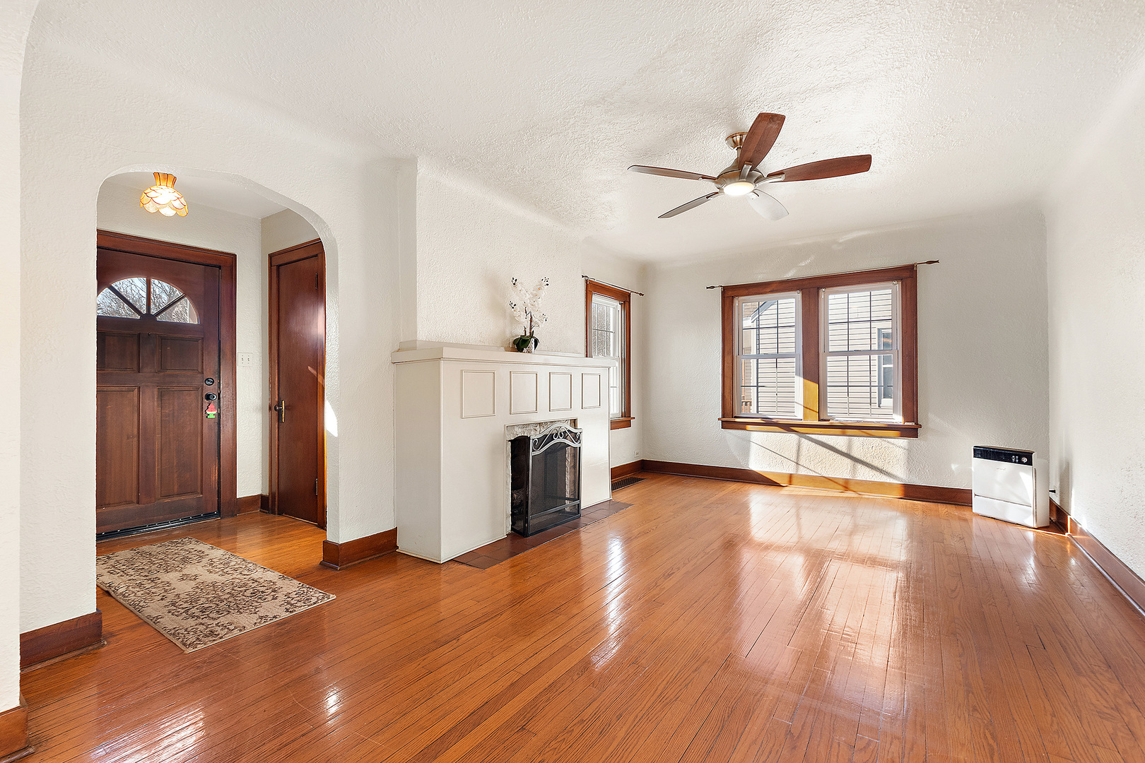 3316 Ann Street Lansing, IL 60438 - Photo 4 of 21 a view of empty room with wooden floor and fan