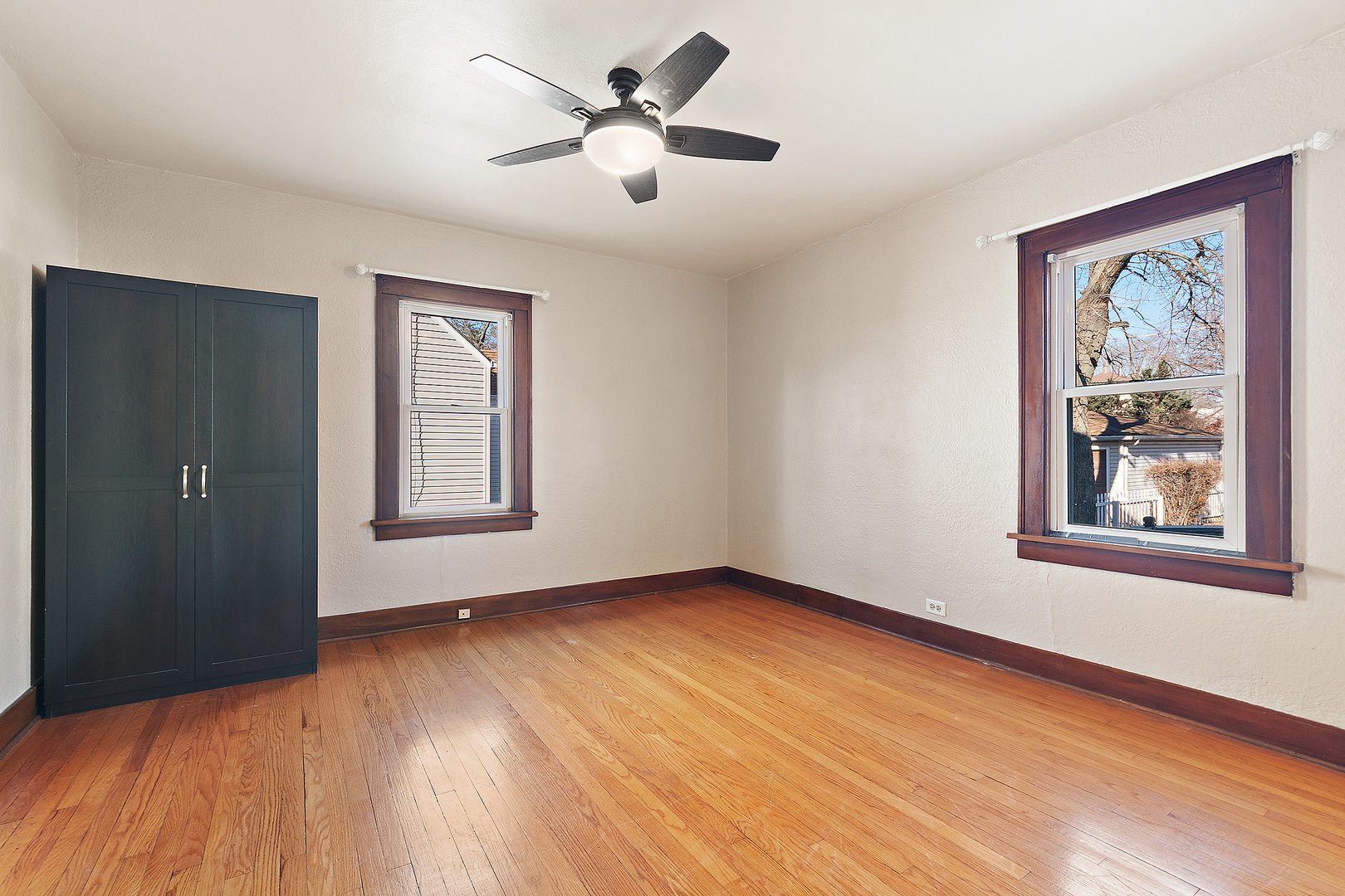 3316 Ann Street Lansing, IL 60438 - Photo 6 of 21 a view of a big room with wooden floor and windows