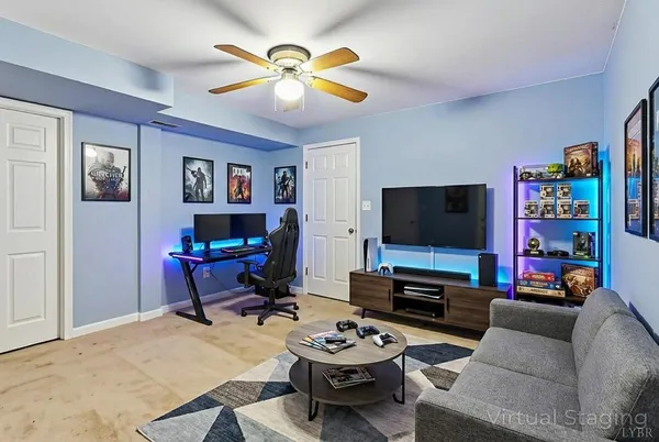 a bedroom with a bed and painting on the wall