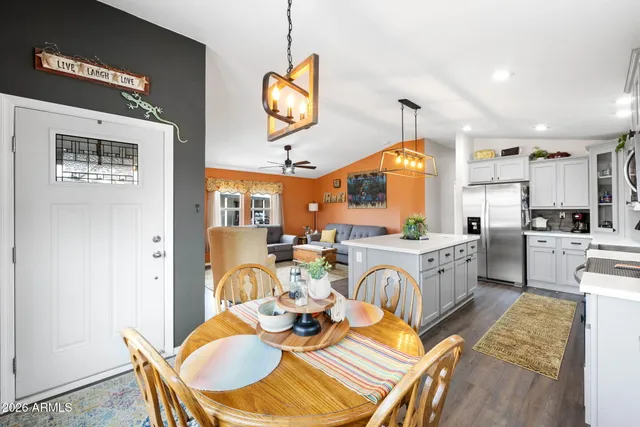 a view of a dining room with furniture