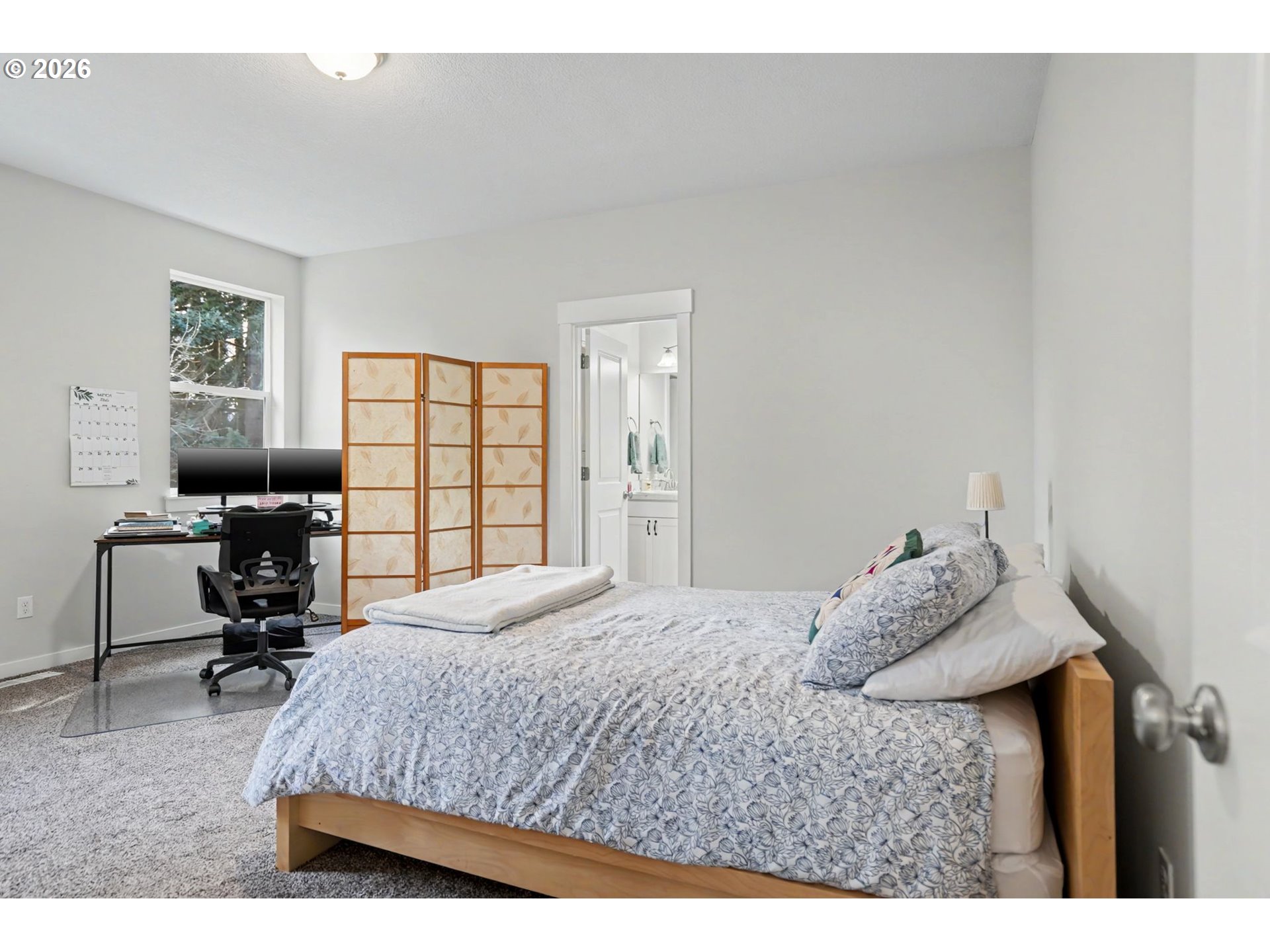 415 Northwest 6th Street Willamina, OR 97396 - Photo 16 of 34 a bedroom with a bed and a window