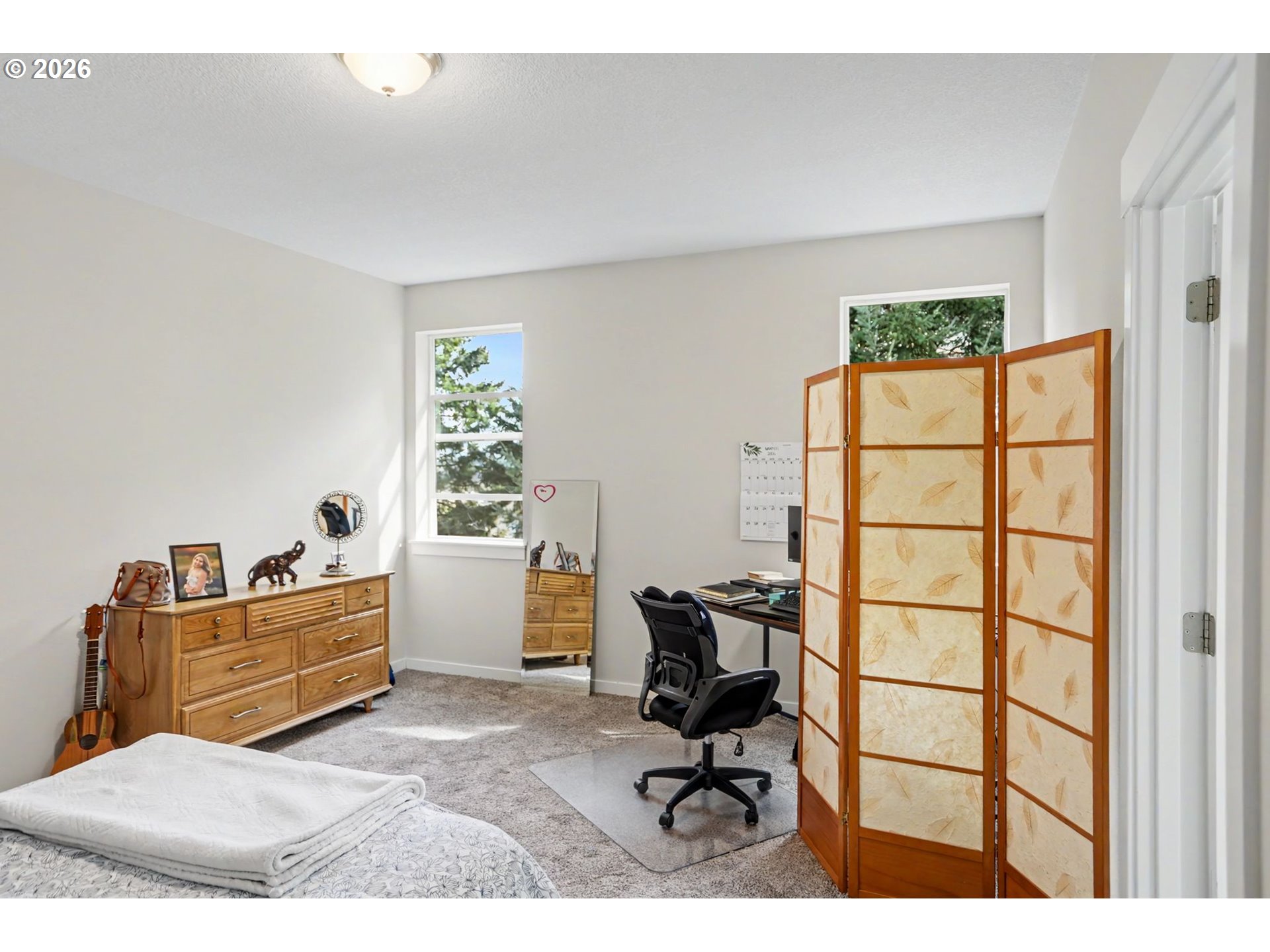 415 Northwest 6th Street Willamina, OR 97396 - Photo 18 of 34 a bedroom with a workspace