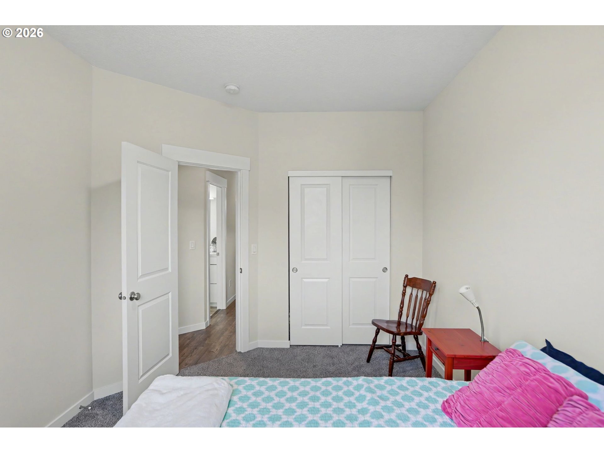415 Northwest 6th Street Willamina, OR 97396 - Photo 22 of 34 a chair and a table in a room