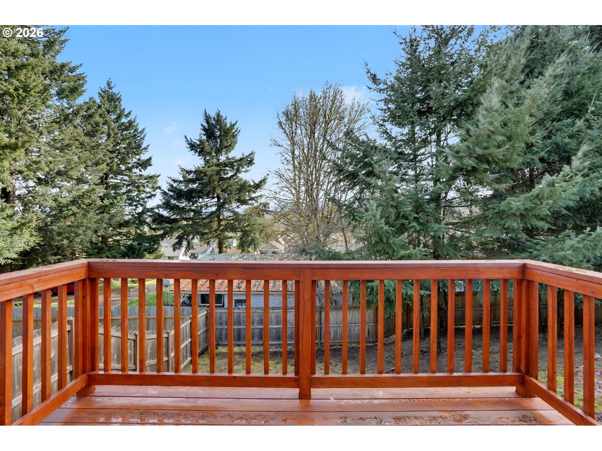 415 Northwest 6th Street Willamina, OR 97396 - Photo 27 of 34 a view of a wooden fence