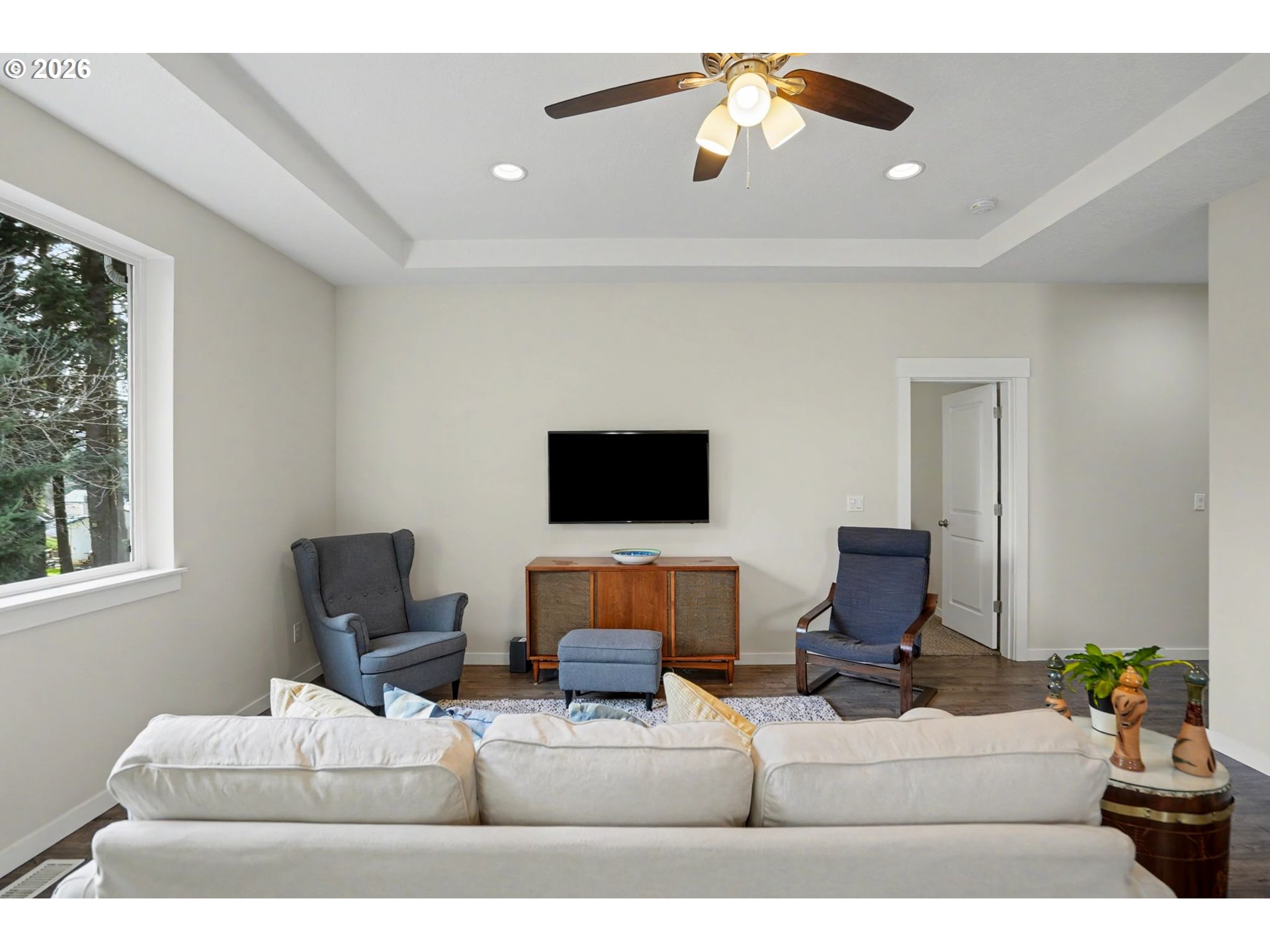 415 Northwest 6th Street Willamina, OR 97396 - Photo 6 of 34 a living room with furniture and a flat screen tv