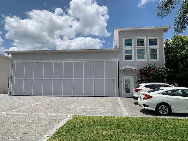 4073 Skyway Drive Naples, FL 34112 - Photo 11 of 14 Living area up & down