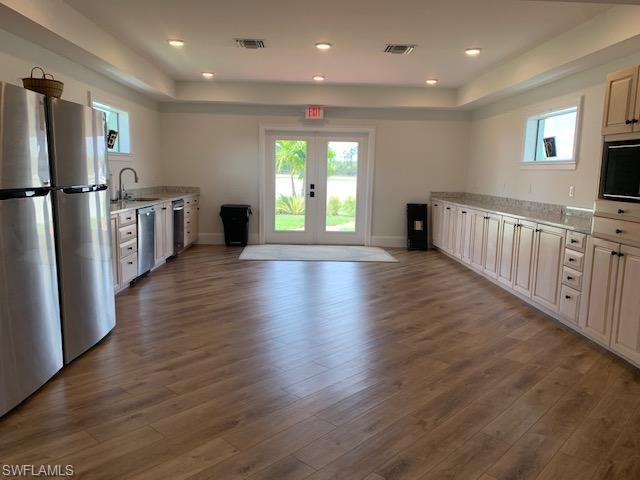 4073 Skyway Drive Naples, FL 34112 - Photo 12 of 14 Pilot Lounge Kitchen