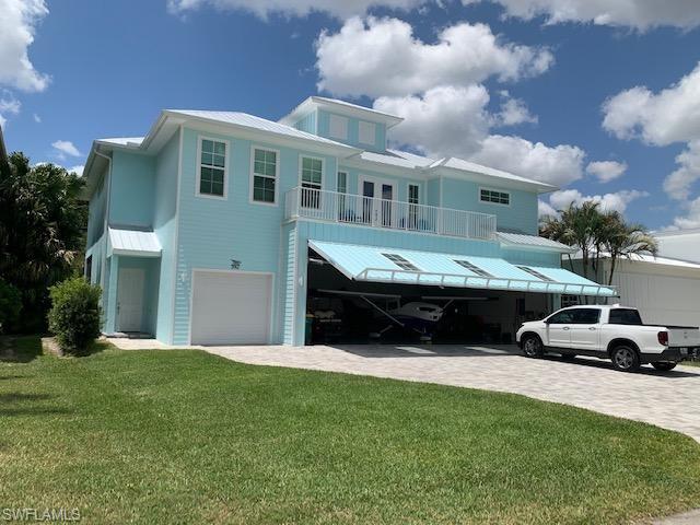 4073 Skyway Drive Naples, FL 34112 - Photo 10 of 14 building living area over hangar