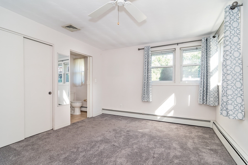 14 Rosslare Road, Unit 14 Framingham, MA 01701 - Photo 12 of 20 an empty room with windows and closet
