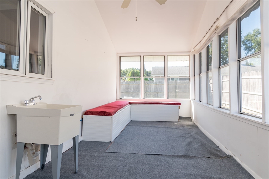 14 Rosslare Road, Unit 14 Framingham, MA 01701 - Photo 17 of 20 a living room with furniture and large windows