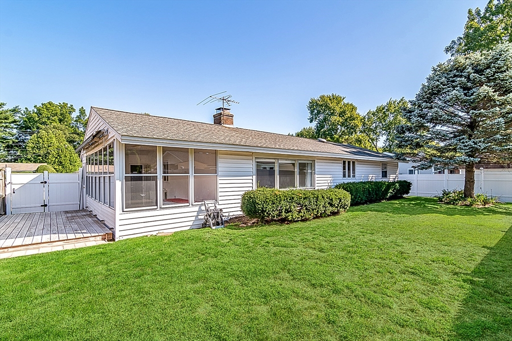 14 Rosslare Road, Unit 14 Framingham, MA 01701 - Photo 20 of 20 a front view of a house with a yard