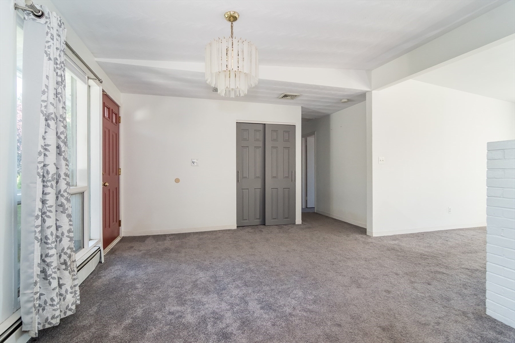 14 Rosslare Road, Unit 14 Framingham, MA 01701 - Photo 6 of 20 a view of an empty room with a window