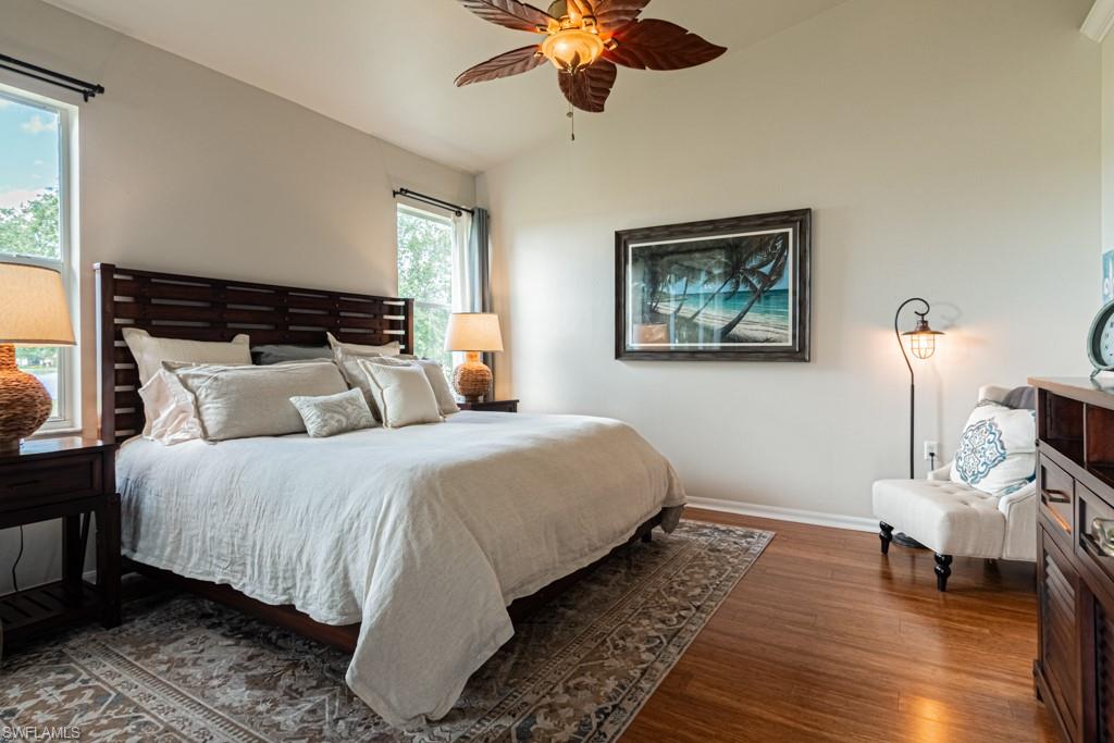 1965 Crestview Way, Unit 156 Naples, FL 34119 - Photo 15 of 45 a bedroom with bed and window