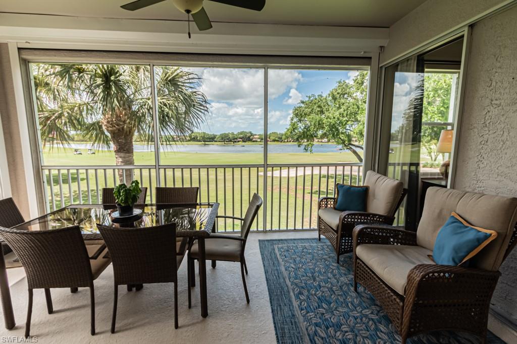1965 Crestview Way, Unit 156 Naples, FL 34119 - Photo 29 of 45 a view of a dining room with furniture window and outside view