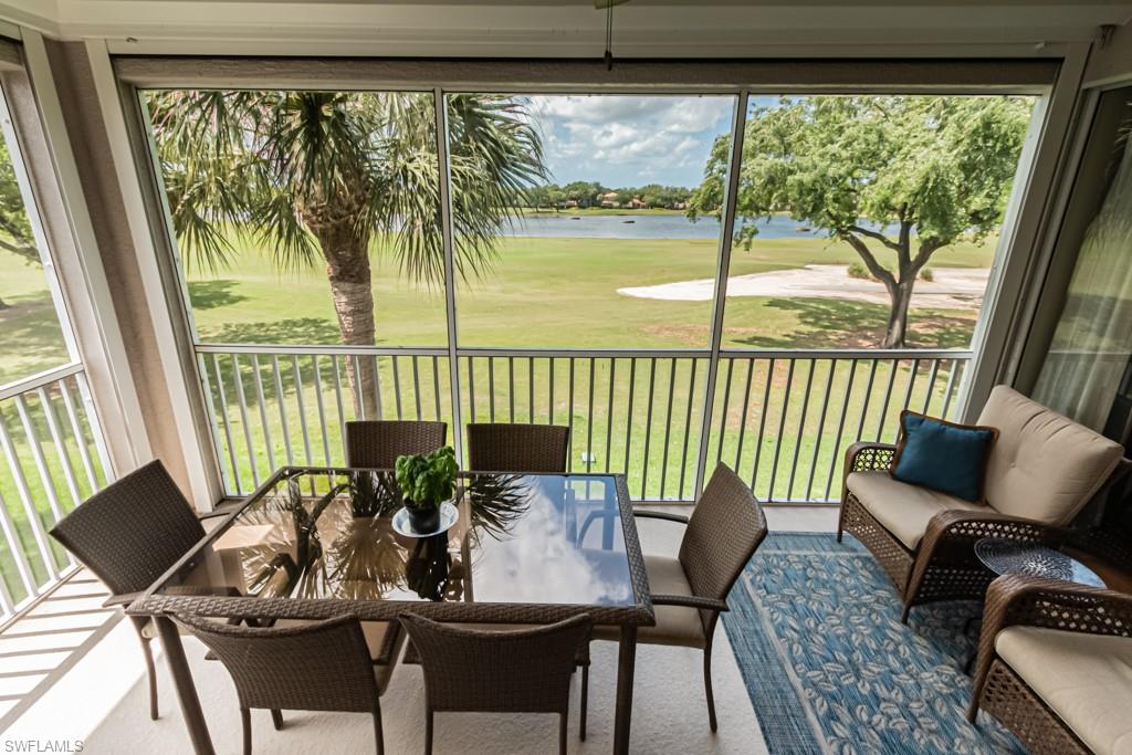 1965 Crestview Way, Unit 156 Naples, FL 34119 - Photo 33 of 45 a view of a dining room with furniture window and outside view
