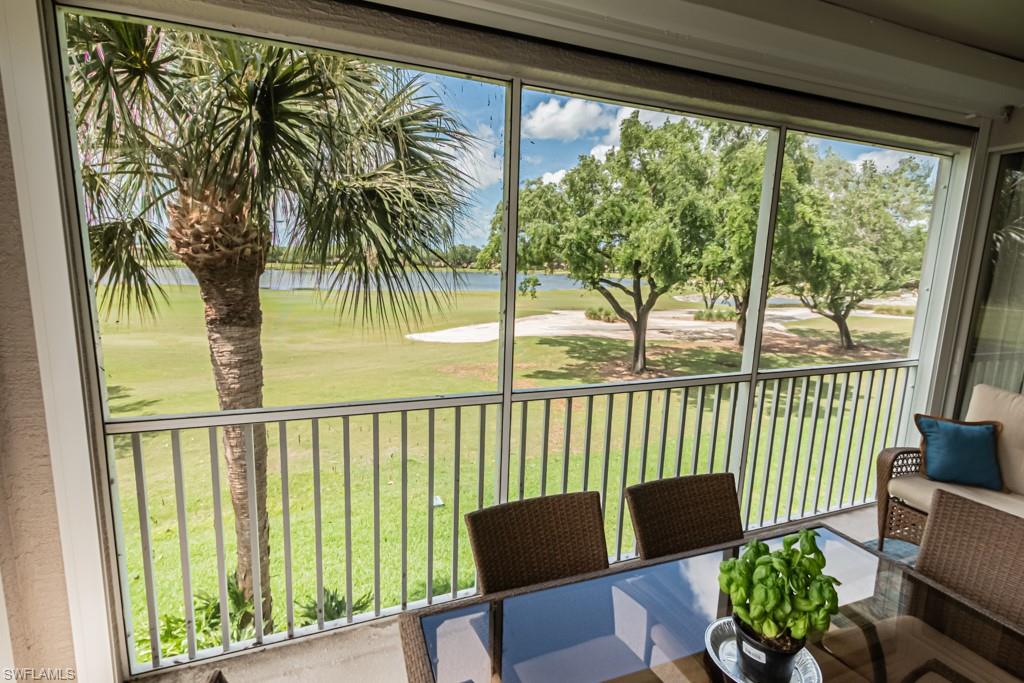 1965 Crestview Way, Unit 156 Naples, FL 34119 - Photo 34 of 45 a balcony with furniture and a potted plant