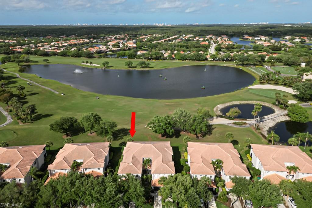 1965 Crestview Way, Unit 156 Naples, FL 34119 - Photo 36 of 45 an aerial view of residential houses with outdoor space
