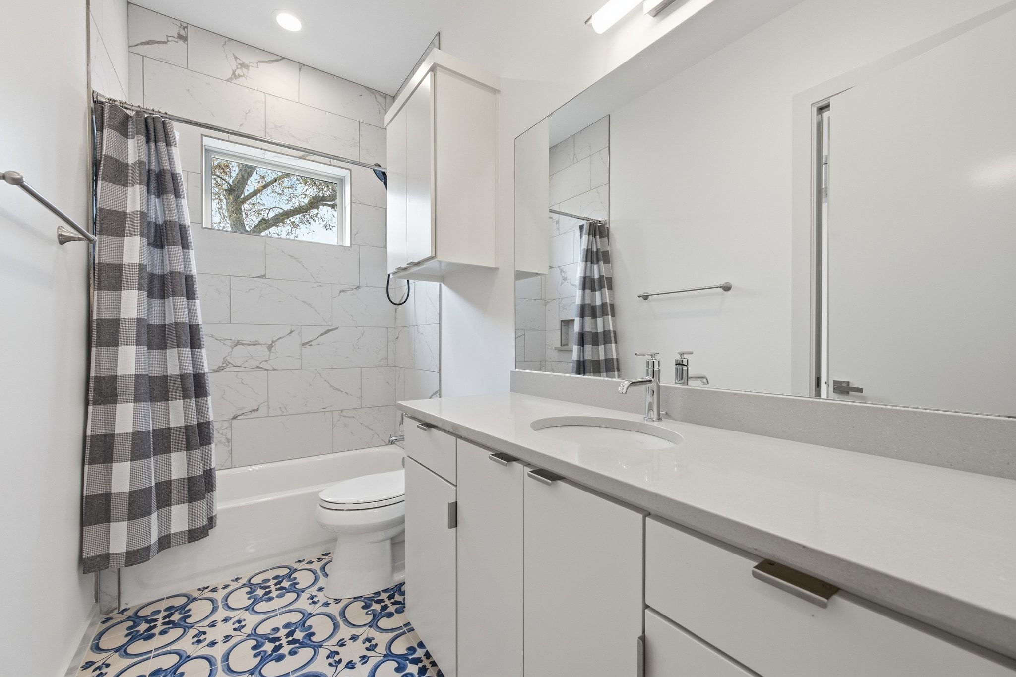 2811 Garwood Street, Unit B Austin, TX 78702 - Photo 15 of 24 Full bath with shower / bath combo, vanity, and light tile patterned floors