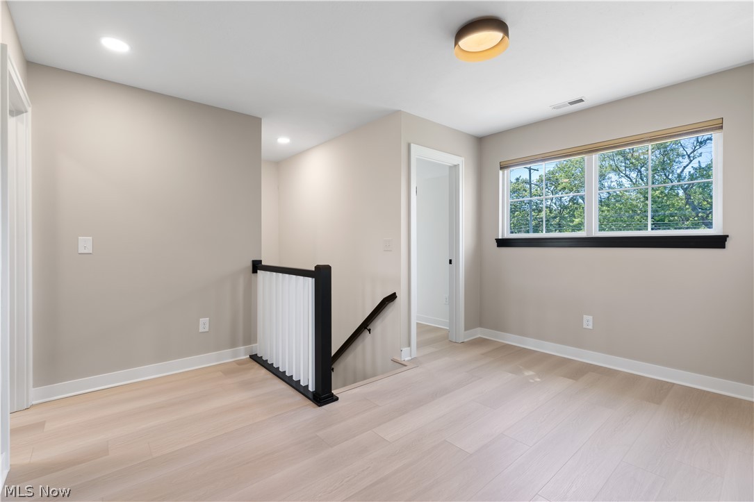 35799 Lorain Road North Ridgeville, OH 44039 - Photo 25 of 50 Spare room featuring light hardwood / wood-style flooring
