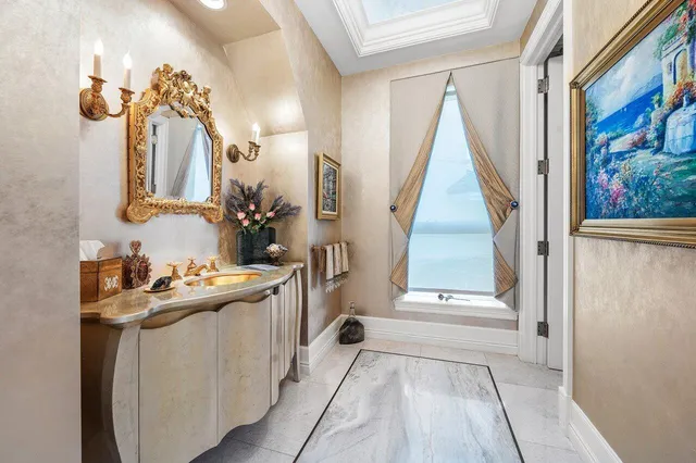 a bed room with a bed and a large window