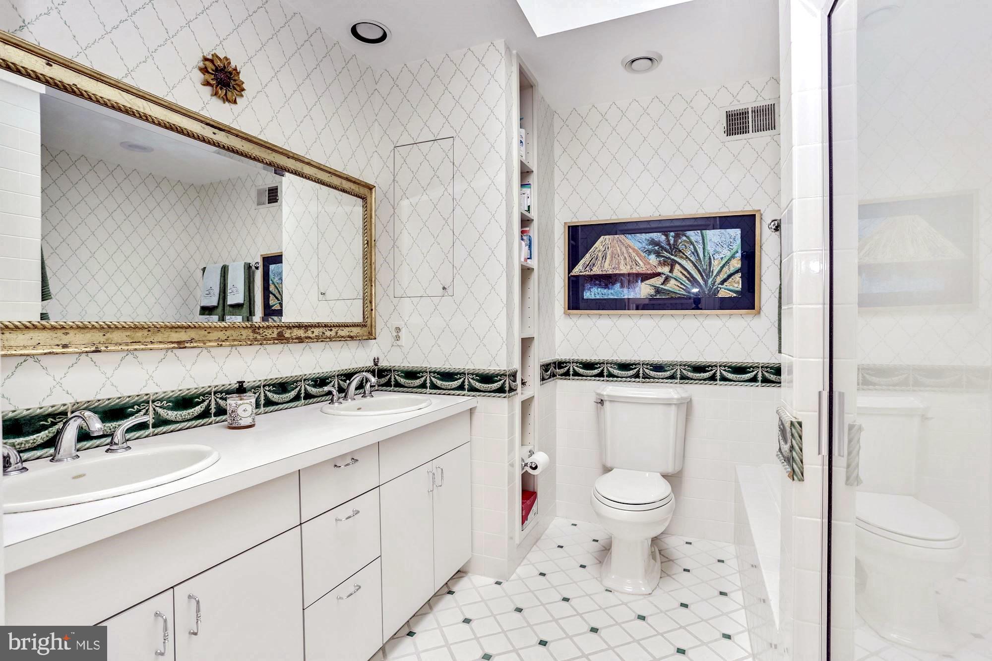 10820 Edison Road Potomac, MD 20854 - Photo 29 of 65 MASTER BATH W/DUAL SINKS, TUB & SEPARATE SHOWER