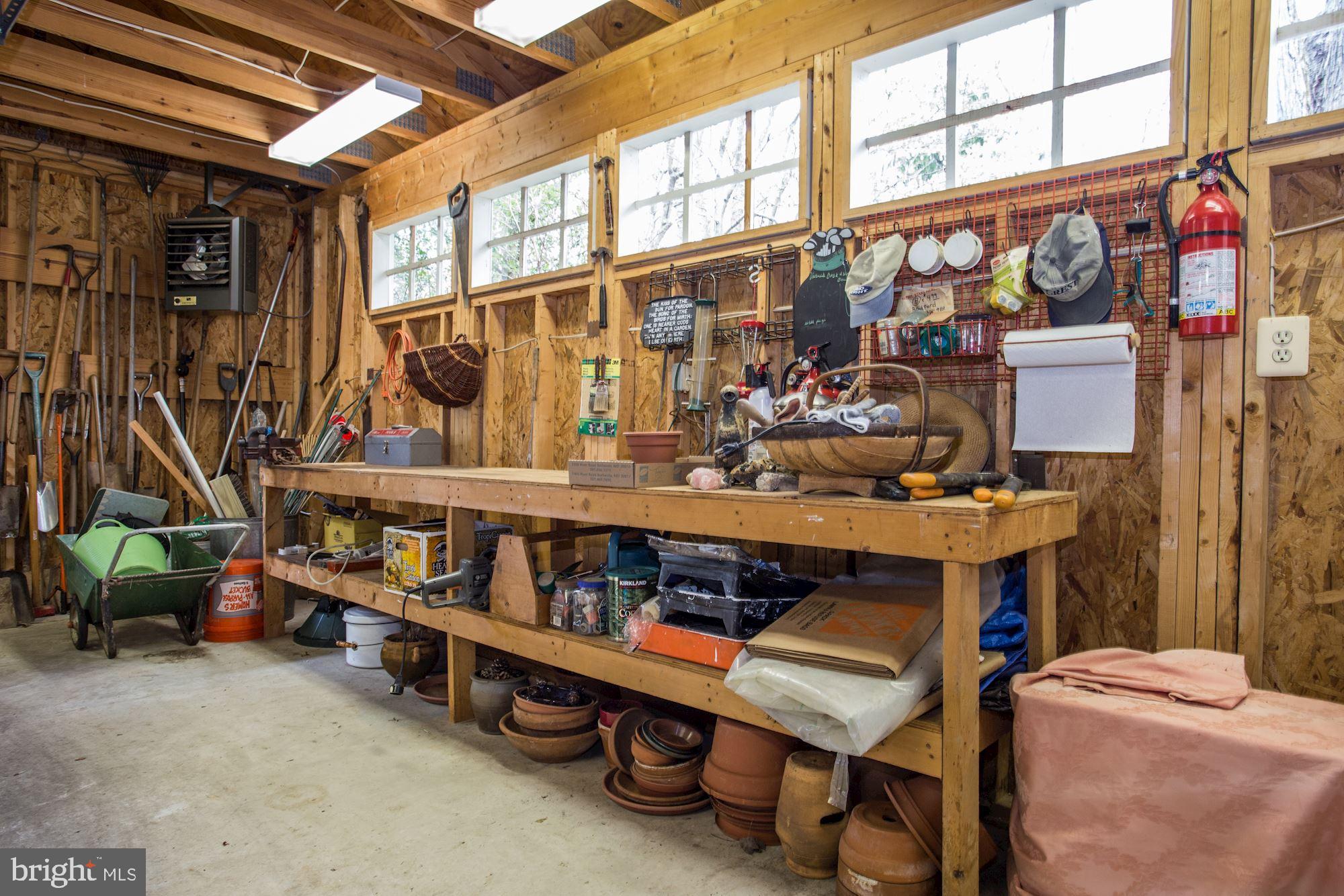 10820 Edison Road Potomac, MD 20854 - Photo 42 of 65 2 1/2 CAR GARAGE HAS HEATER, WORKSHOP & 2ND LEVEL