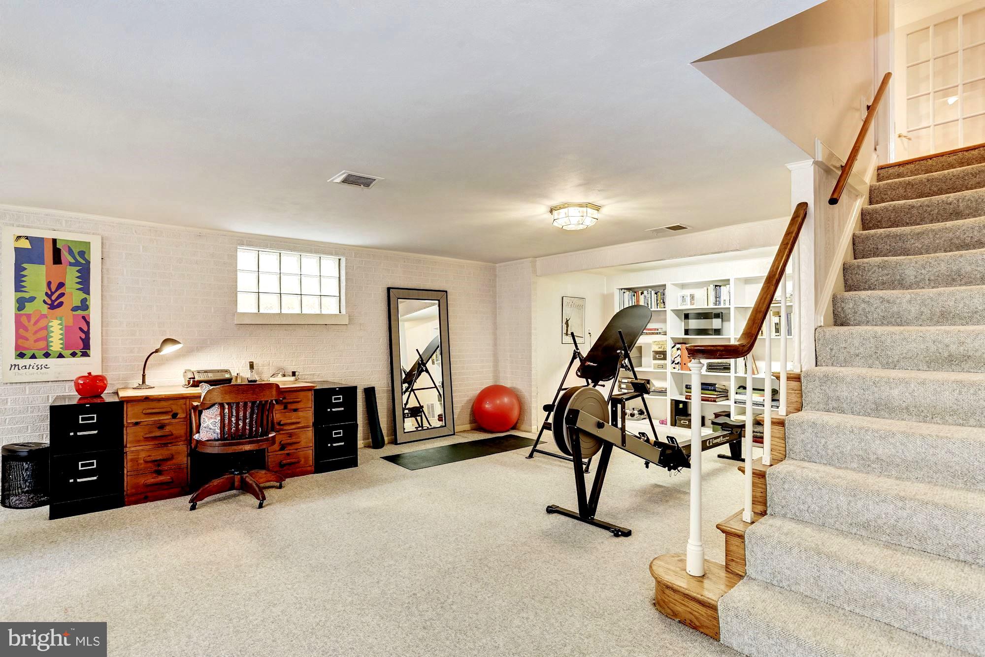 10820 Edison Road Potomac, MD 20854 - Photo 44 of 65 LONG REC ROOM PROVIDES PLENTY OF FLEXIBLE SPACE