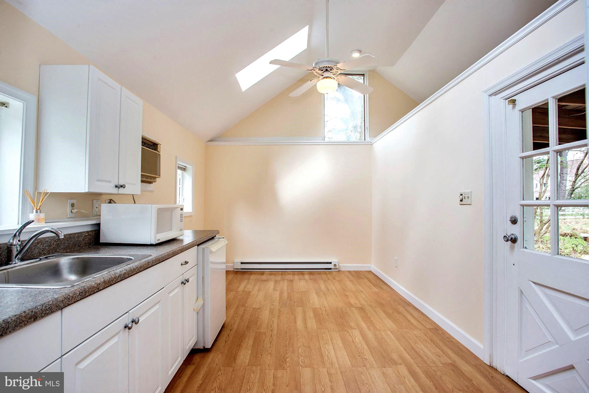 10820 Edison Road Potomac, MD 20854 - Photo 59 of 65 POOL HOUSE HAS LIVING AREA AND 2 SKYLIGHTS