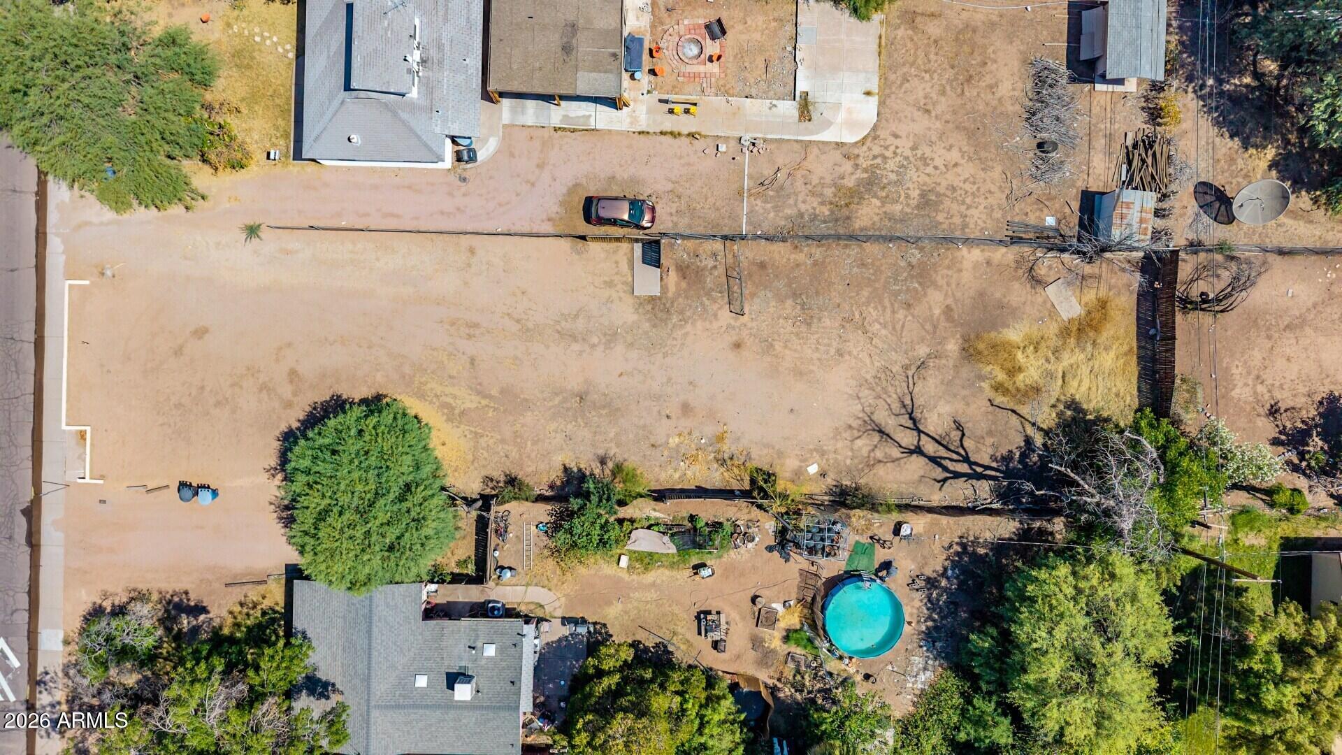 919 South Wilson Street, Unit 5 Tempe, AZ 85281 - Photo 13 of 14 an aerial view of a house with a yard and a fountain
