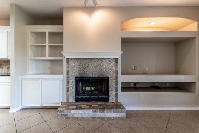 a living room with a fireplace