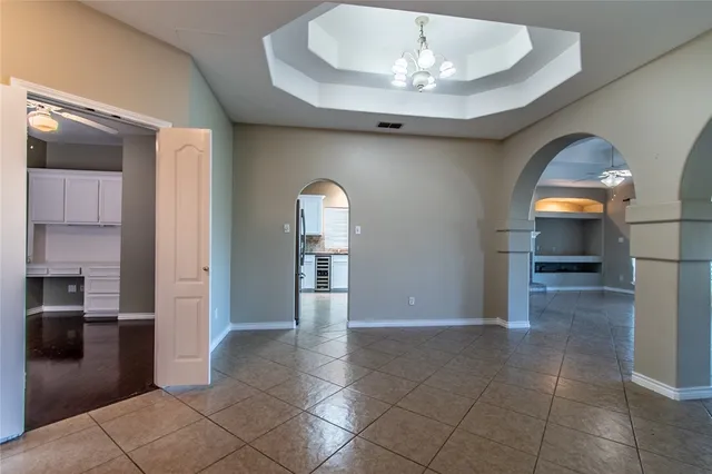 a view of entryway with kitchen