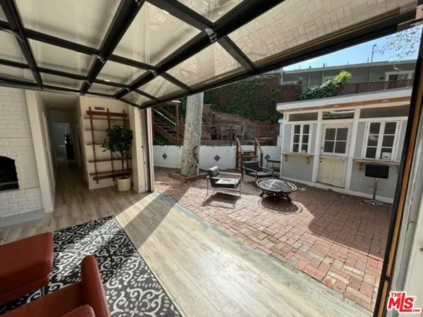 a view of a porch with furniture