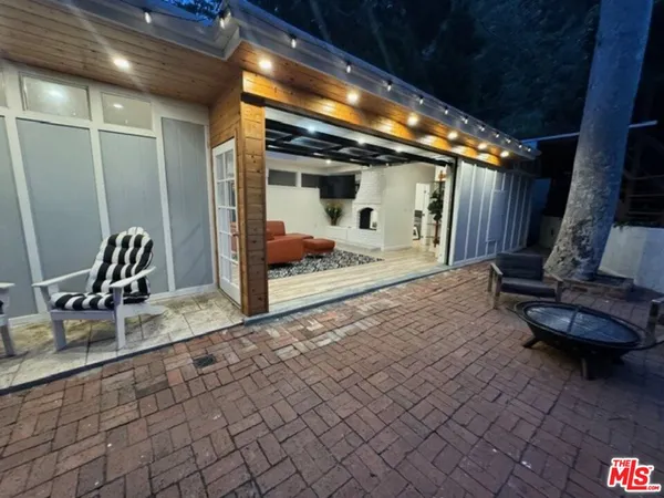 a outdoor dining space with furniture