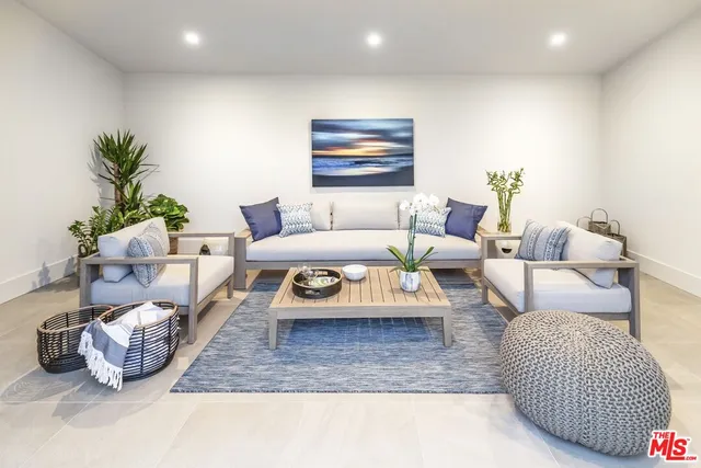 a view of a city from a dining room with a table