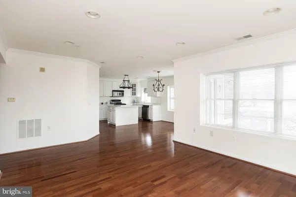 a view of kitchen with wooden floor