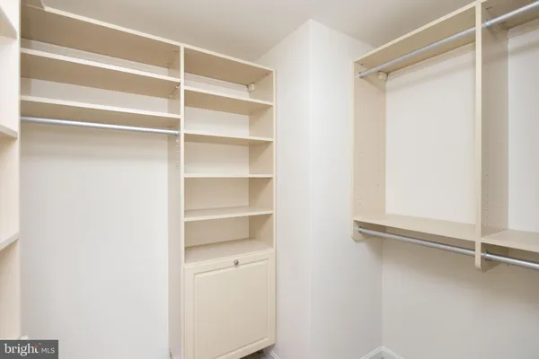 a view of an empty walk in closet