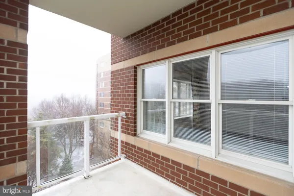 a view of a balcony with a door