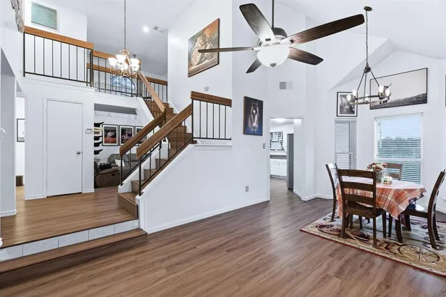 a view of a livingroom with furniture and wooden floor