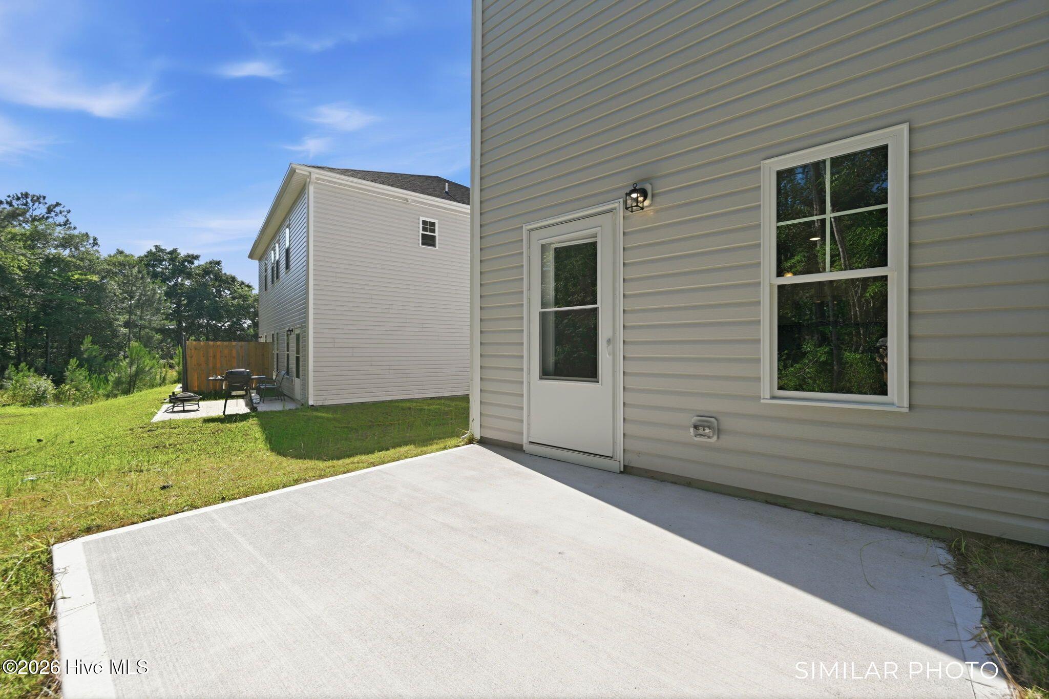 207 Holly Sands Loop Sneads Ferry, NC 28460 - Photo 36 of 45 Similar Photo - Back Patio