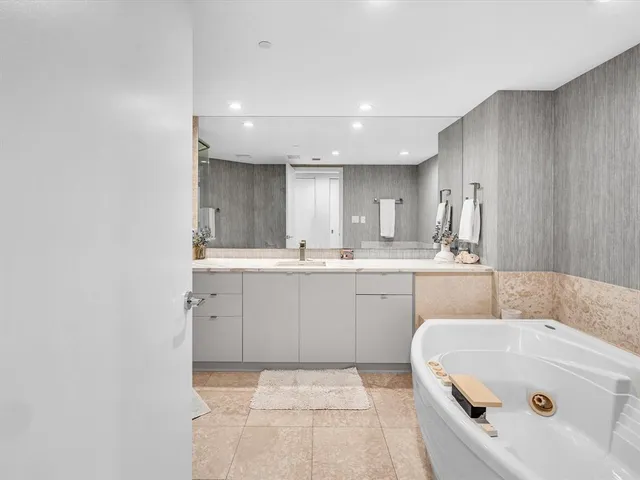 a bathroom with a shower and a toilet