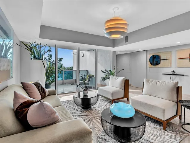 a kitchen with stainless steel appliances granite countertop a stove sink and cabinets
