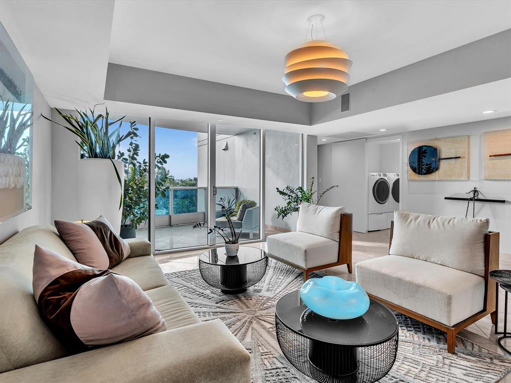 1600 South Ocean Boulevard, Unit 403 Pompano Beach, FL 33062 - Photo 33 of 52 a living room with furniture and a large window